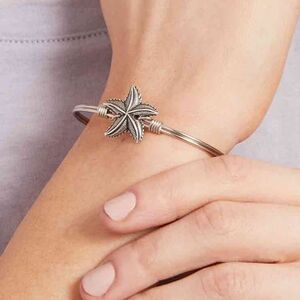 LUCA+DANNI SILVER TONE STARFISH PETITE BANGLE BRACELET.